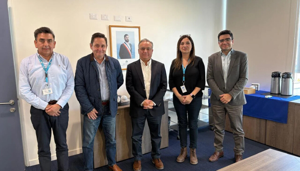 Ejecutivos de EPSA y Frutas de Chile tras la reunión.