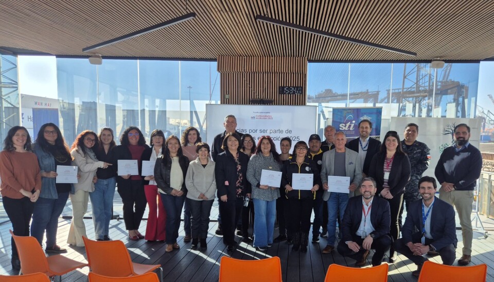Participantes de la iniciativa junto a ejecutivos del terminal portuario.